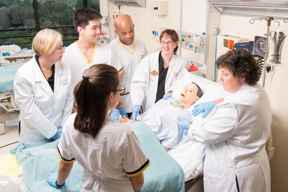 faculty and students in skill lab