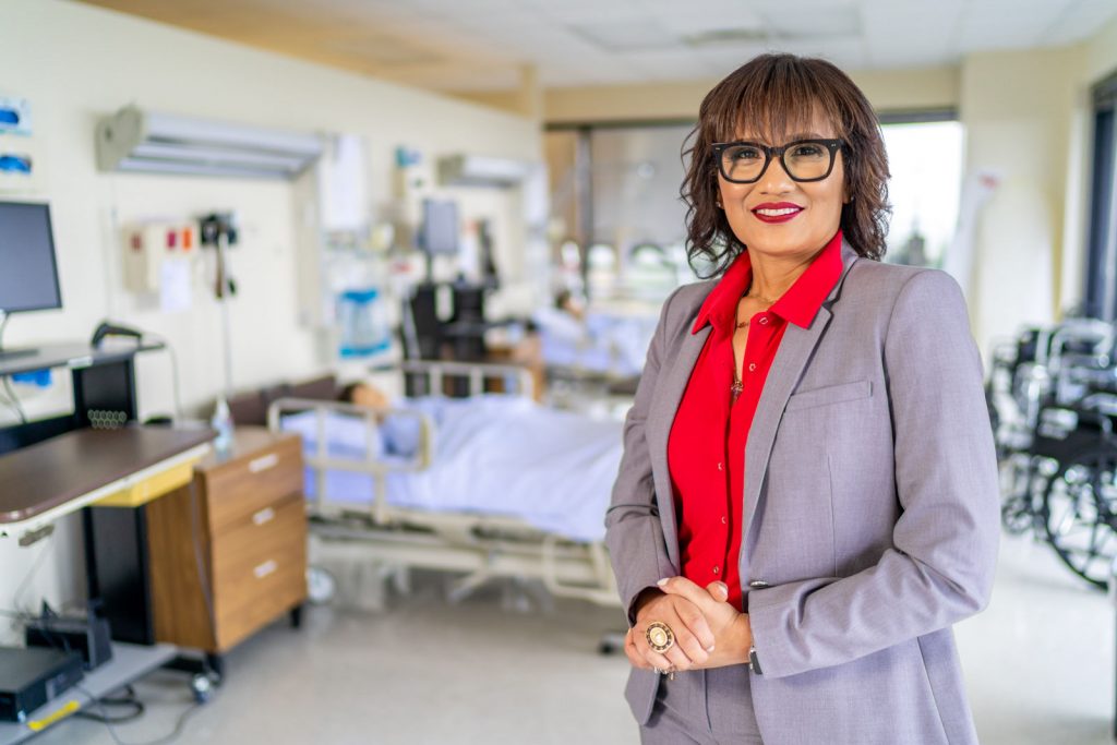 Michelle Tall, McKnight Doctoral Fellowship recipient, standing in a nursing lab