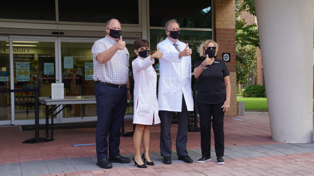 UCF clinical leaders, Drs. Deborah German, vice president for health affairs and dean of the College of Medicine, Michael Deichen, leader of UCF Student Health Services, Mary Lou Sole, dean of the UCF College of Nursing, and Christopher Ingersoll, dean of the College of Health Professions and Sciences (CHPS)