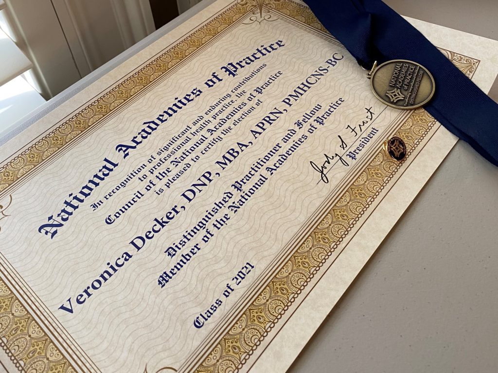 National Academies of Practice Distinguished Fellow Certificate and Medallion awarded to Dr. Veronica Decker, UCF College of Nursing