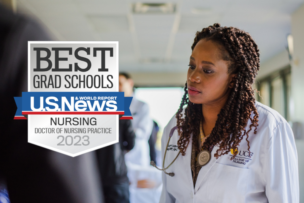 UCF College of Nursing Doctor of Nursing Practice graduate in white lab coat with U.S. News & World Report Best Grad Schools 2023 badge