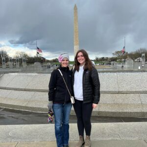UCF College of Nursing students Alexis Wade and Lauren Fuller in front of the Washington Monument in Washington, D.C.