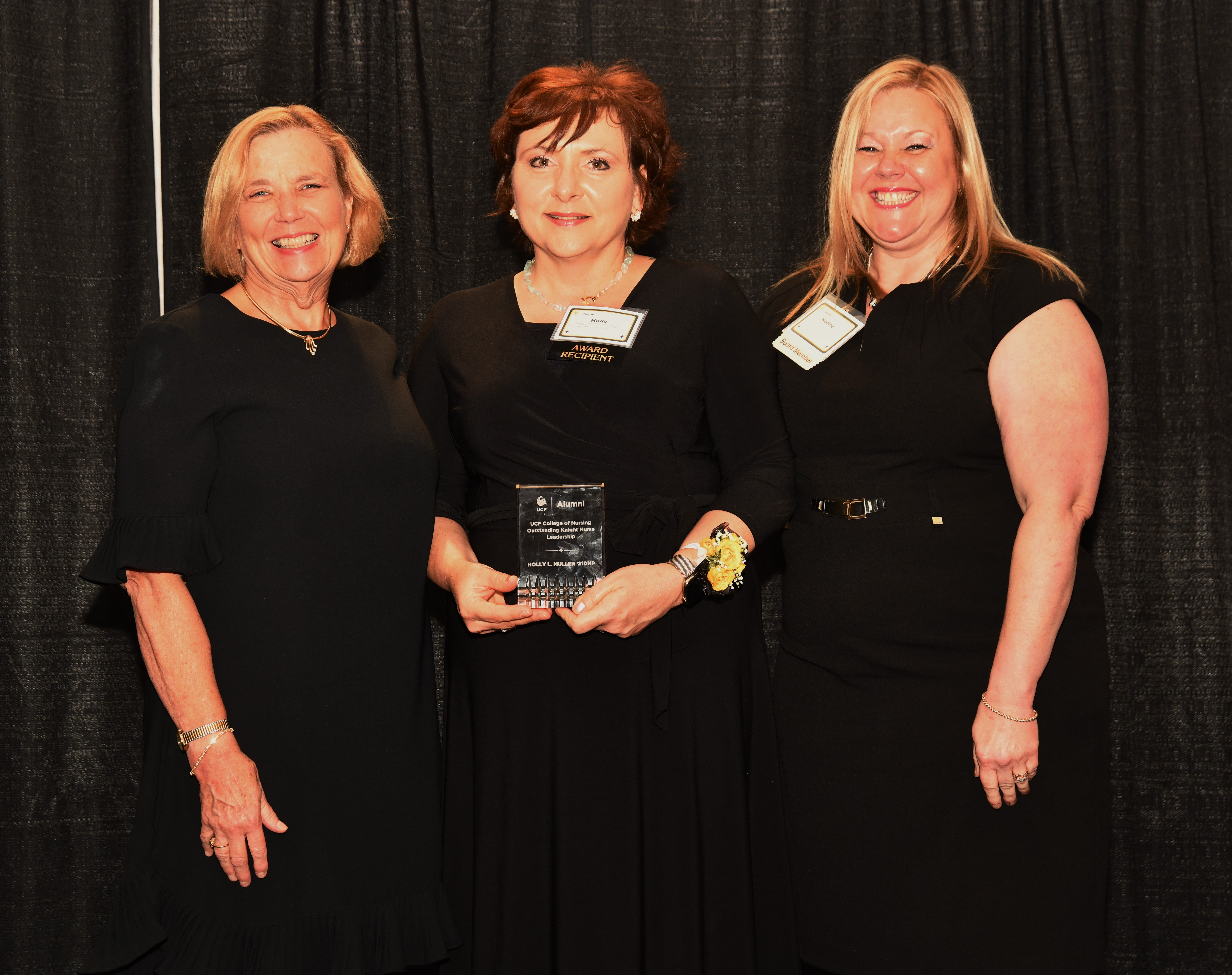 Holly Muller, Outstanding Knight Nurse Awardee with Dean Mary Lou Sole and Alumni Chapter Recognition Chair Nadine Garci