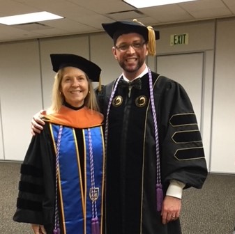 Veronica Decker with UCF Nurse Executive DNP graduate Chad Rhoden