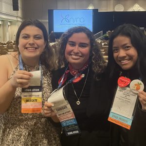 UCF College of Nursing students Samantha Garcia, center, with SNA at UCF Orlando president Kaitlyn Yu on right, and BSN junior Jamie Lanza on left at the 2023 National Student Nurses' Convention