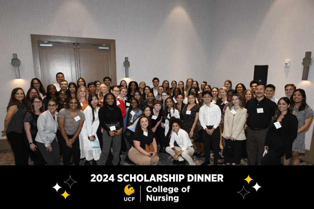 Large group of UCF nursing students inside a ballroom for the 2024 UCF College of Nursing Scholarship Dinner