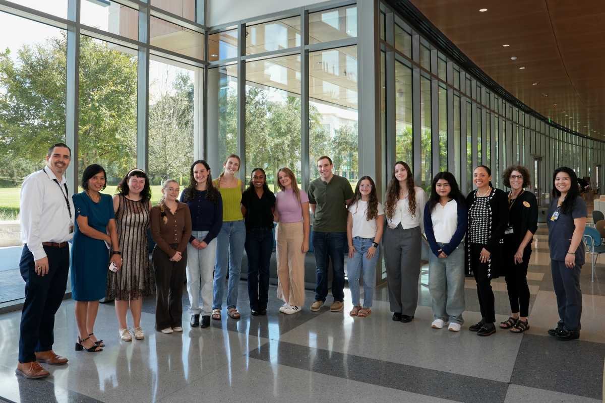 Student scholars alongside faculty advisors.