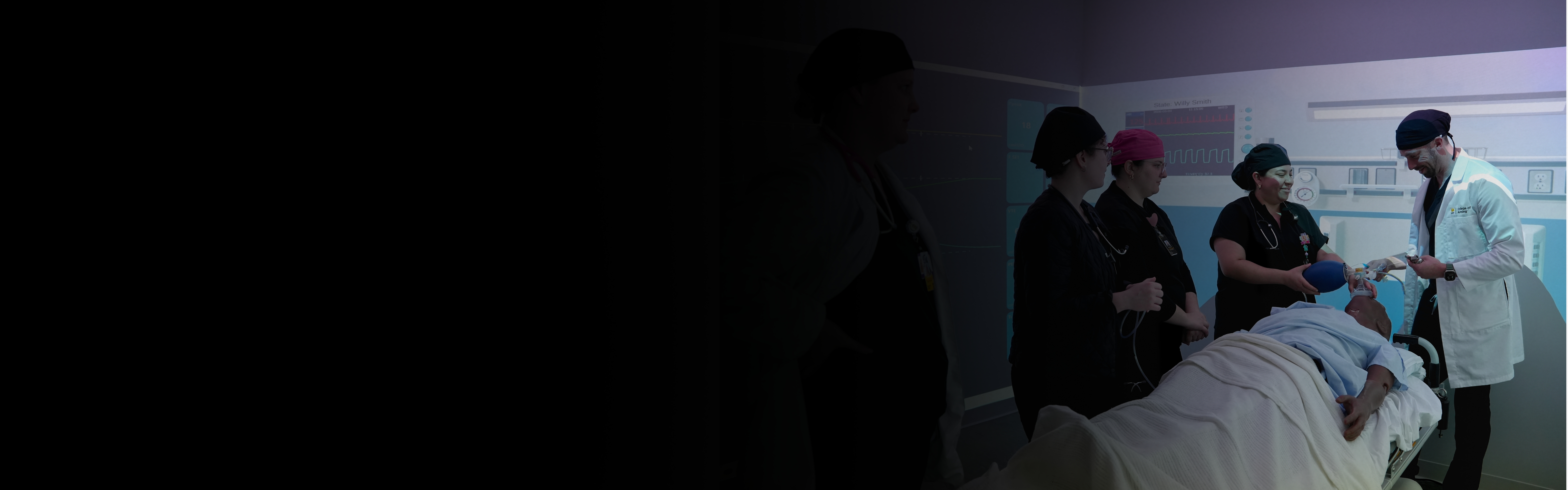 Nursing students practicing in the simulated VR cave.
